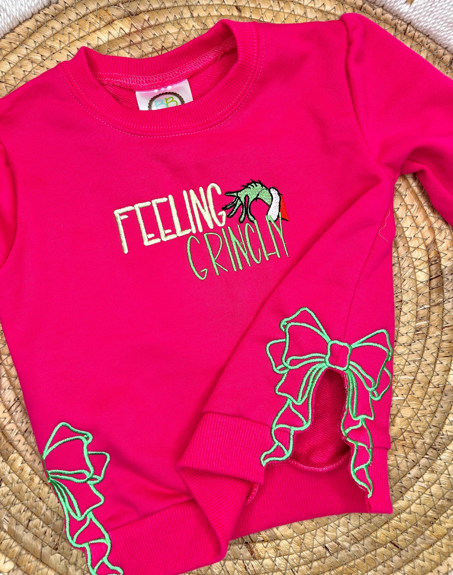 Girls Feeling Grinchy side bow sweatshirt